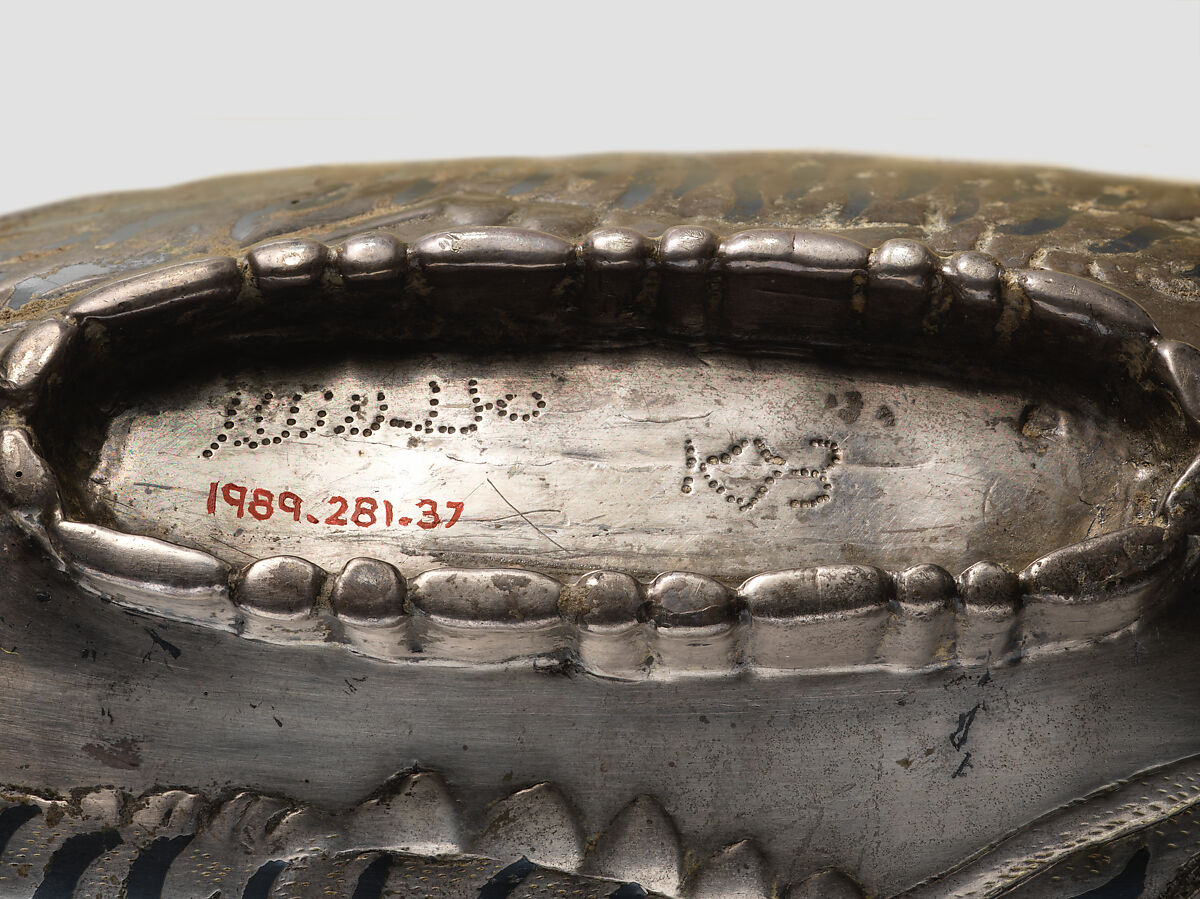 Oval bowl with running tigresses on each side, Silver, niello inlay, Sasanian