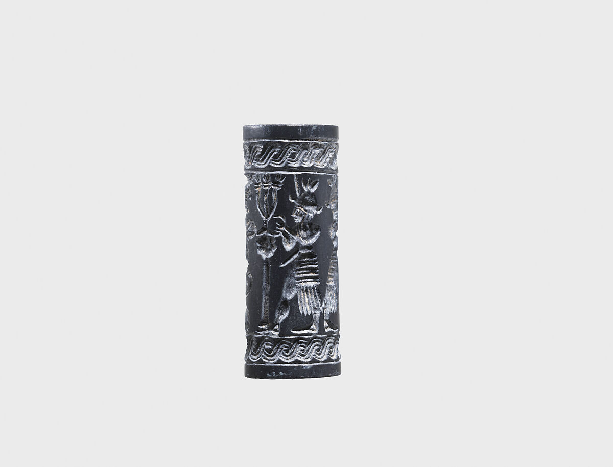 Cylinder seal and modern impression: weather gods framing heraldic griffins at tree below winged sun disc and ibexes, Hematite