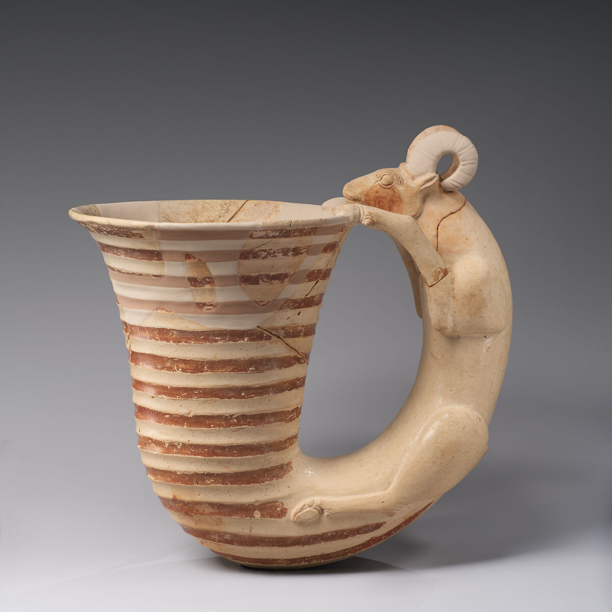 Vessel with a handle in the form of a ram, Ceramic, paint, Iran