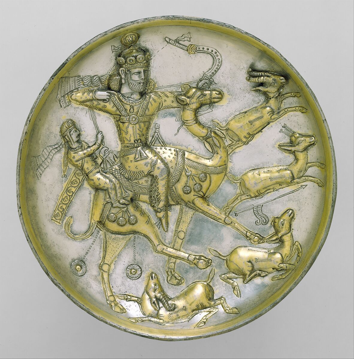 Plate with a hunting scene from the tale of Bahram Gur and Azadeh, Silver, mercury gilding, Sasanian 
