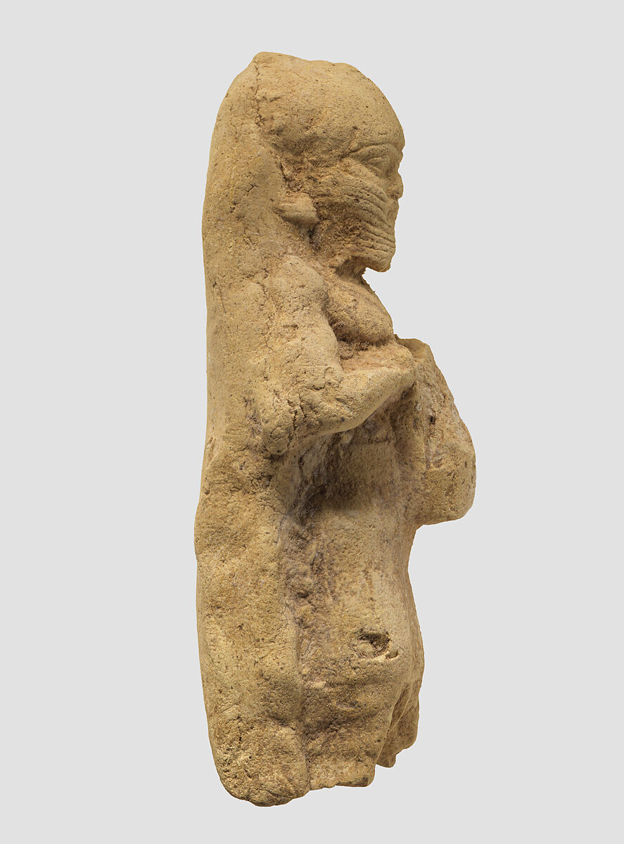Figurine plaque: bearded man playing a drum, Ceramic, Babylonian