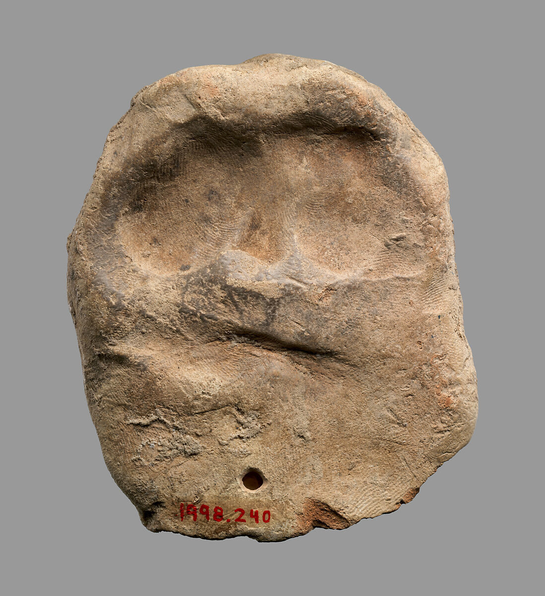 Ceramic imitation of bronze roller with two kilted figures, Ceramic