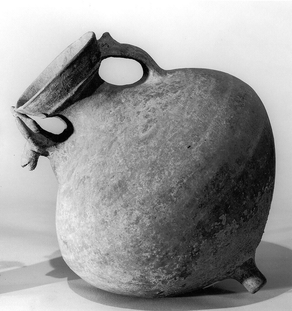 Twin-spouted vessel with animal head spout, Ceramic, Iran 