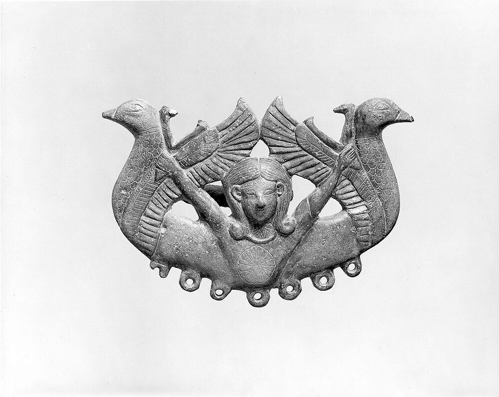 Harness or bridle fitting (?) in the form of a mistress of animals and waterbirds, Bronze 
