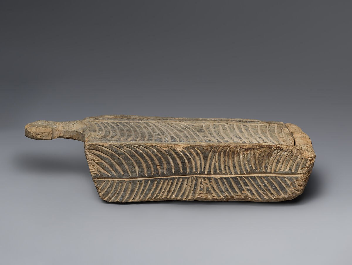 Rectangular wooden cosmetic or amulet box with sliding lid, Wood (poplar?), Alanic