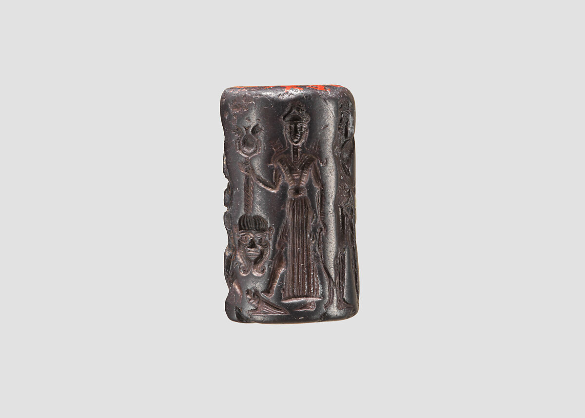Cylinder seal and modern impression: heroes and animals in combat, head of the monster Humbaba, Hematite, Babylonian