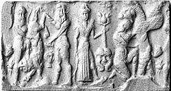 Cylinder seal and modern impression: heroes and animals in combat, head of the monster Humbaba, Hematite, Babylonian 
