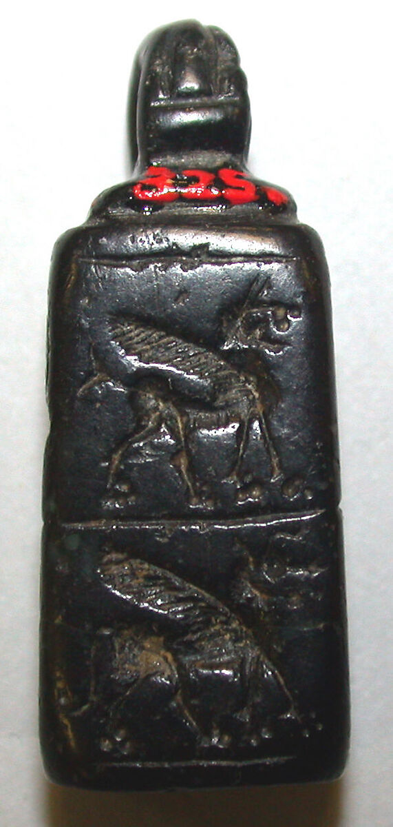 Stamp seal (cubical with loop handle) with monsters and anthropomorphic figure, Serpentine, Urartian 