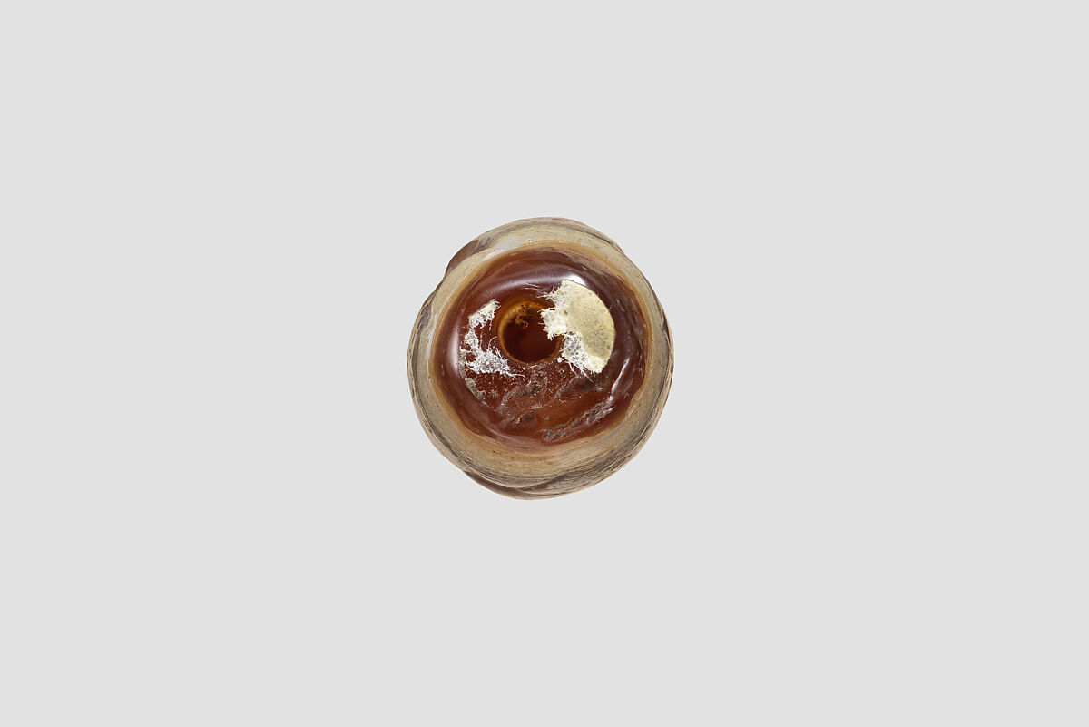 Cylinder seal with three-figure contest scene, Brown and white Agate (Quartz), Babylonian or Achaemenid