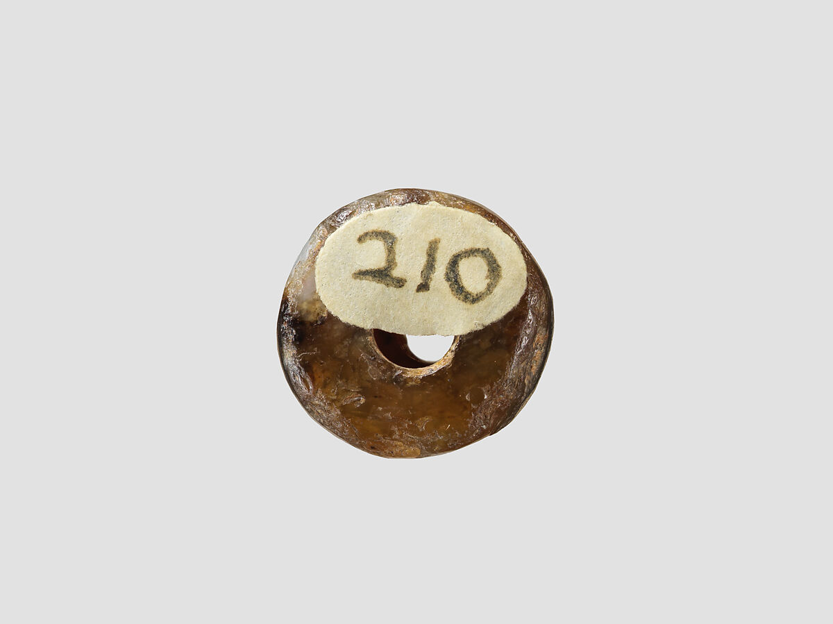 Cylinder seal with cultic scene, Mottled and flawed brown and white Chalcedony (Quartz), Assyro-Babylonian