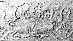 Cylinder seal and modern impression: two horned animals, rosettes