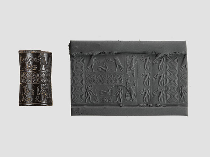 Cylinder seal and modern impression: rows of animals; falcons flanking goat, Taweret goddesses