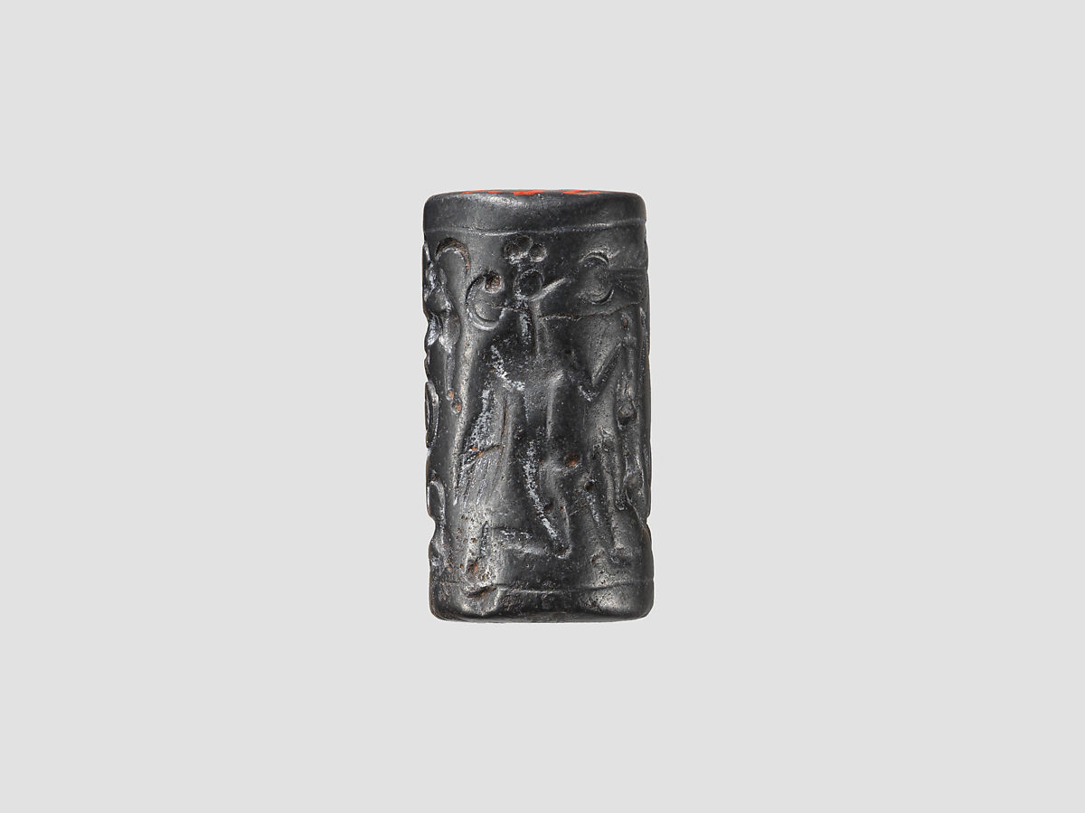 Cylinder seal and modern impression: male and griffin demon slaying animal; terminal: animal attack scenes, guilloche, Hematite, Mitanni