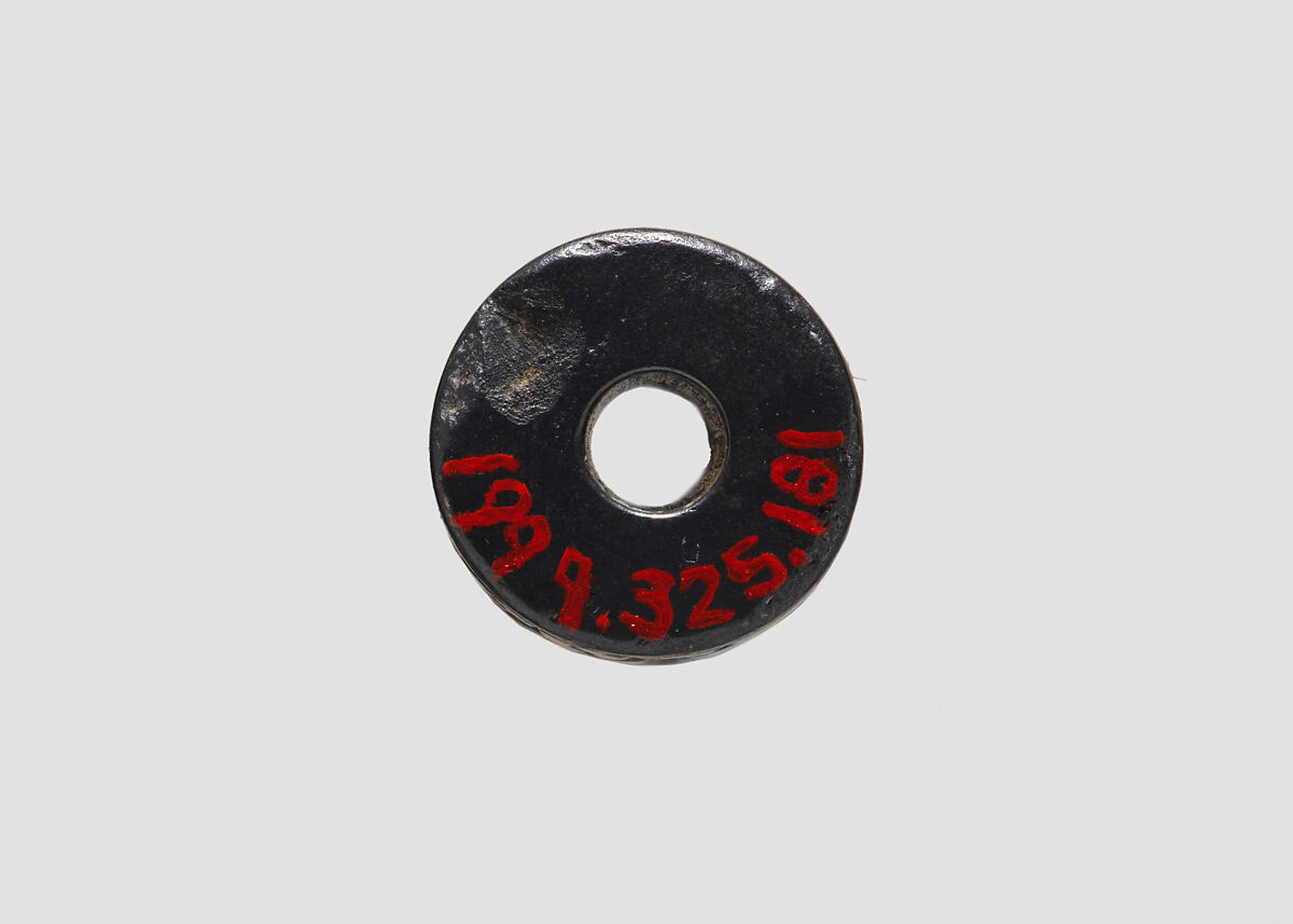 Cylinder seal and modern impression: two bullmen flanking sun-disc; horse, griffin, Hematite, Mitanni