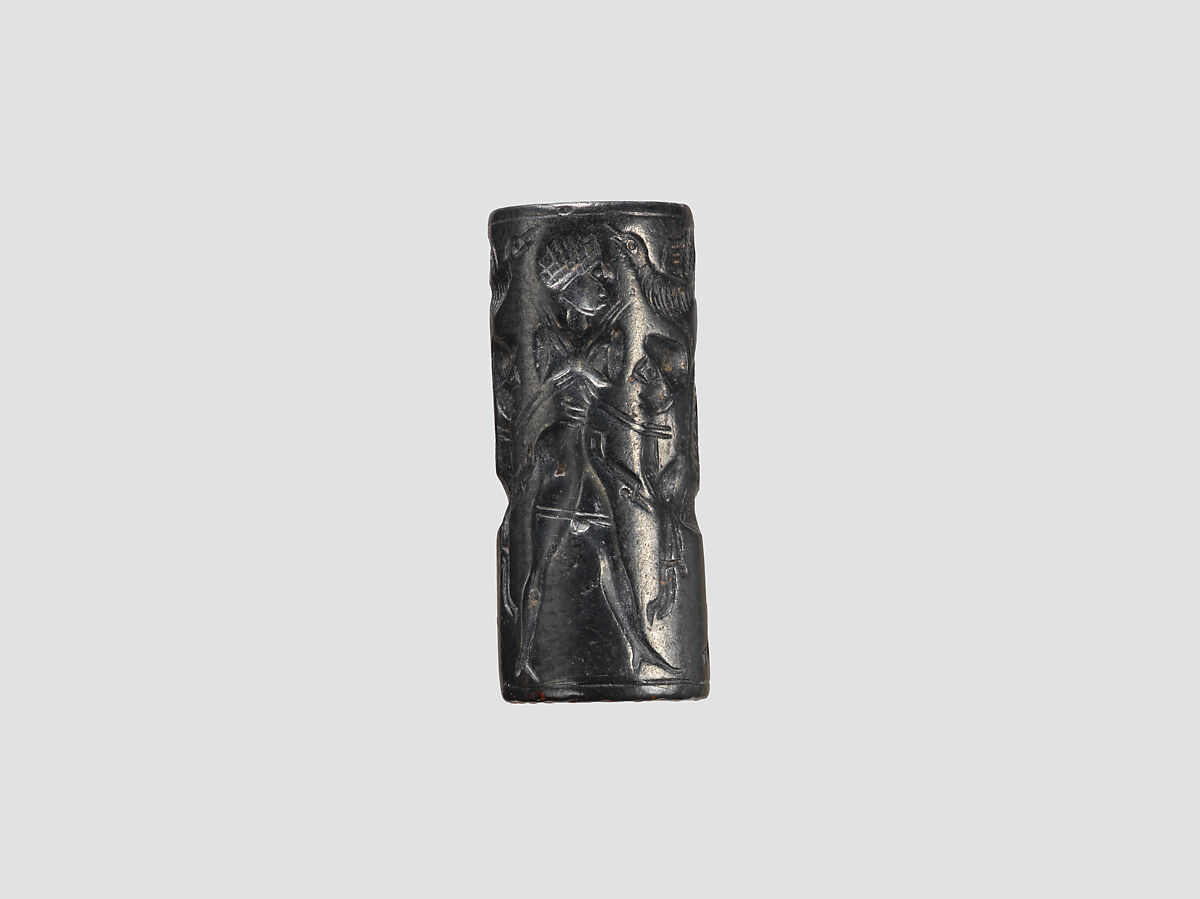 Cylinder seal and modern impression: human figure flanked by sphinxes, birds, Hematite, Cypriot