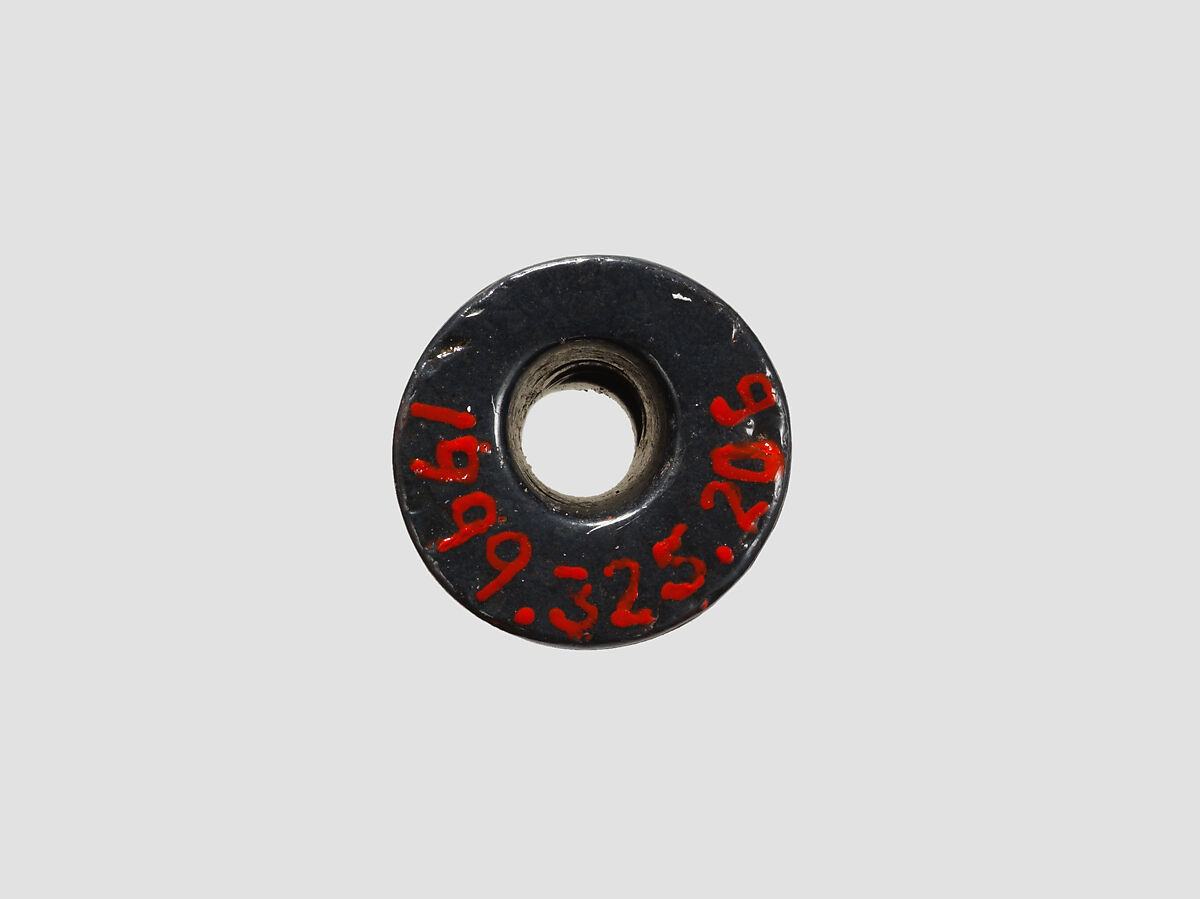 Cylinder seal and modern impression: human figure flanked by sphinxes, birds, Hematite, Cypriot