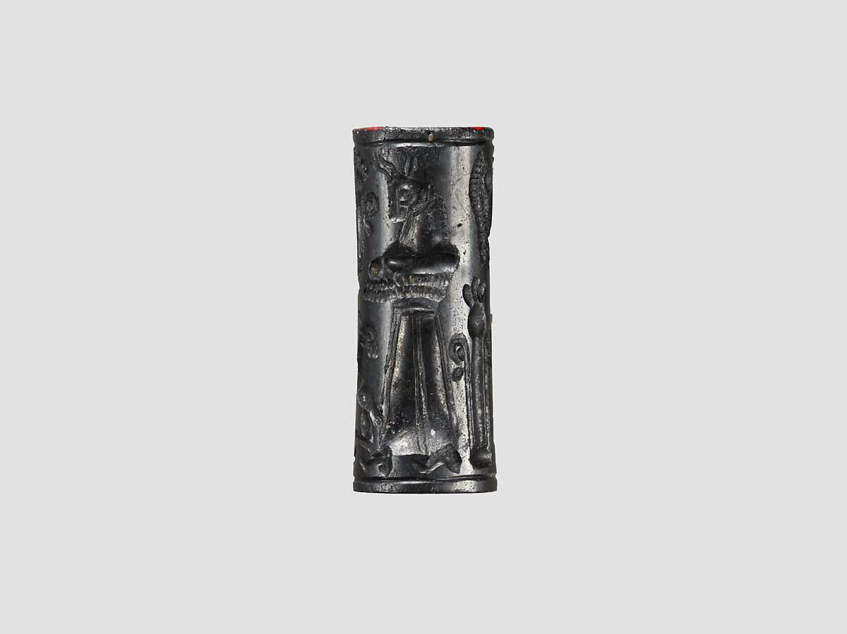 Cylinder seal and modern impression: animal-headed divinities with prey, Hematite, Cypriot