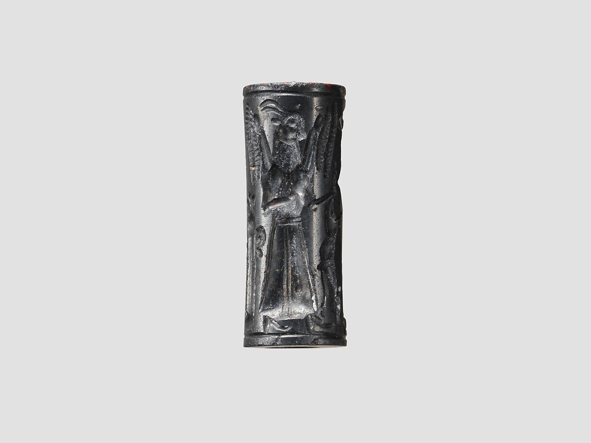 Cylinder seal and modern impression: animal-headed divinities with prey, Hematite, Cypriot