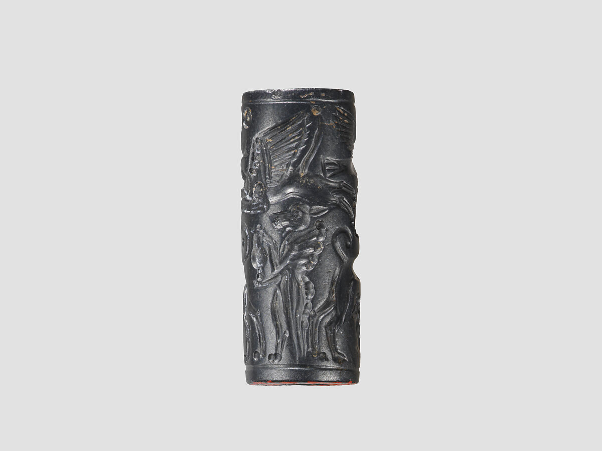 Cylinder seal and modern impression: Master of Animals between lions, griffins, Minoan genius, Hematite