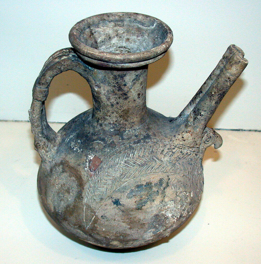 Spouted jar with eagle incised in high relief, Ceramic 