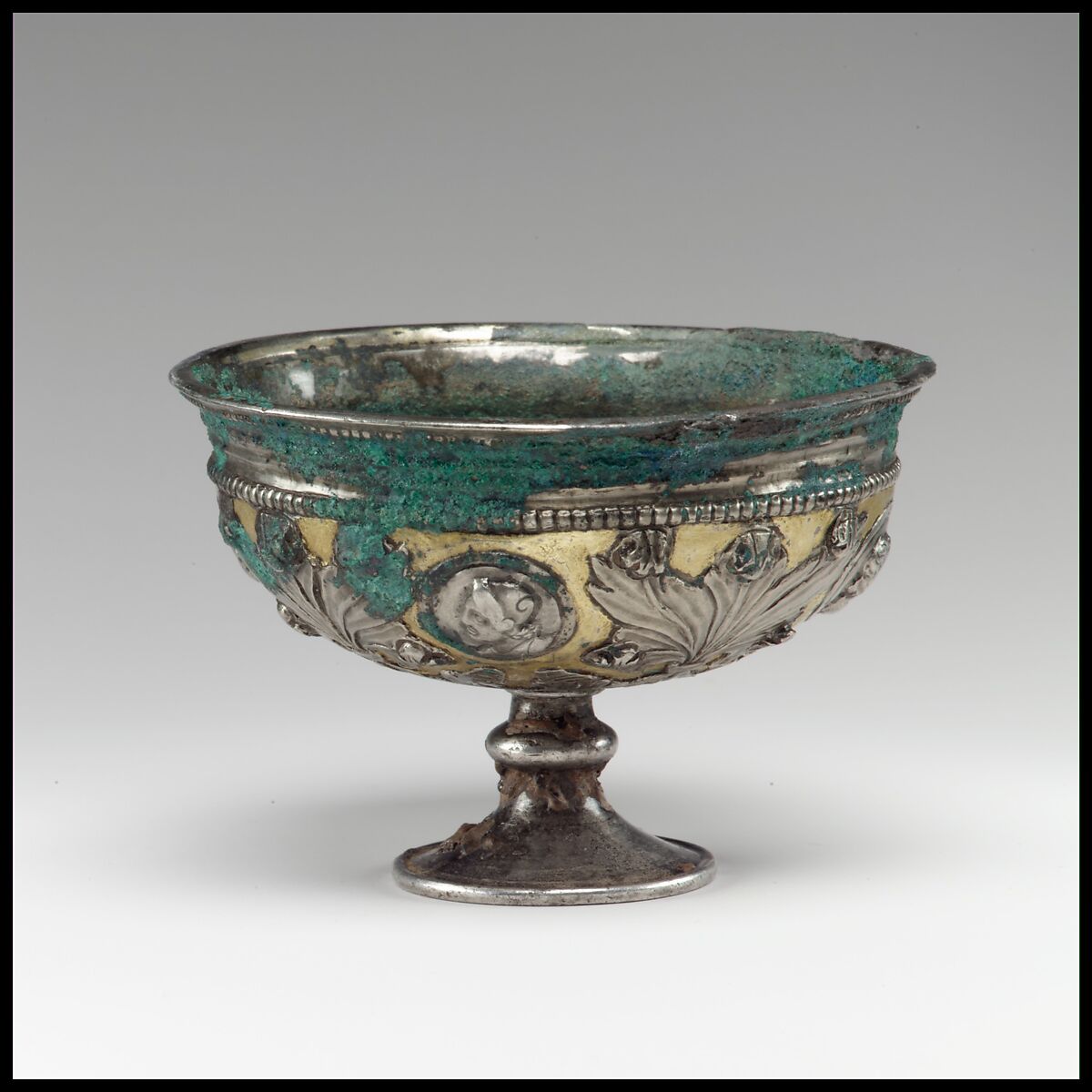 Footed cup with human busts in medallions, Silver, gilt, Kushano-Sasanian 