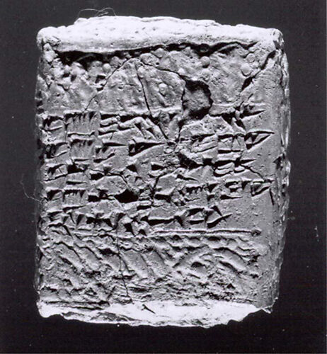 Cuneiform tablet case impressed with three cylinder seals, for cuneiform tablet 66.245.14a: loan of silver