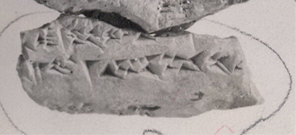 Cuneiform tablet impressed with three seals: fragment, content uncertain, Clay, Achaemenid 
