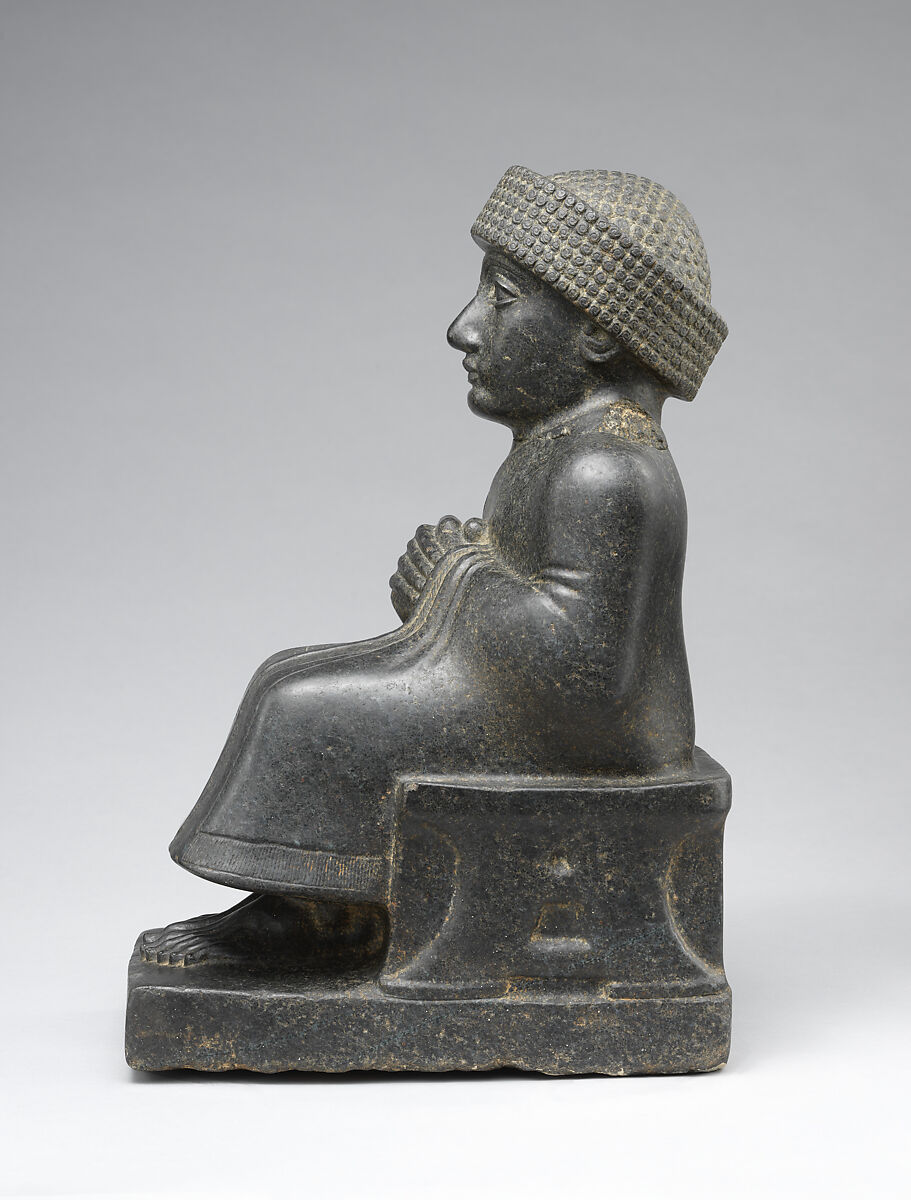 Statue of Gudea, named “Gudea, the man who built the temple, may his life be long”, Diorite, Neo-Sumerian