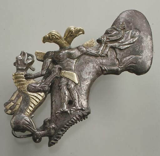 Shaft-hole axe head with bird-headed demon, boar, and dragon