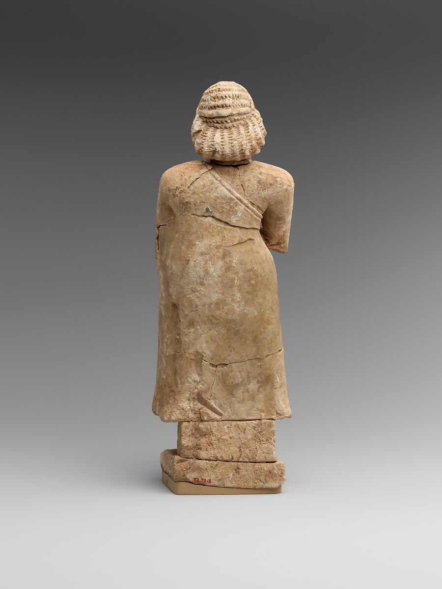 Standing female worshiper, Limestone, inlaid with shell and lapis lazuli, Sumerian