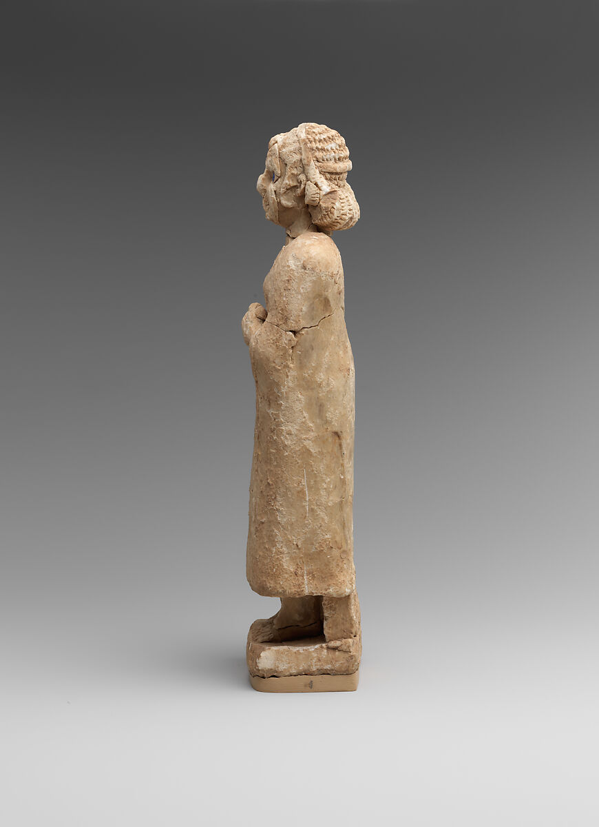 Standing female worshiper, Limestone, inlaid with shell and lapis lazuli, Sumerian
