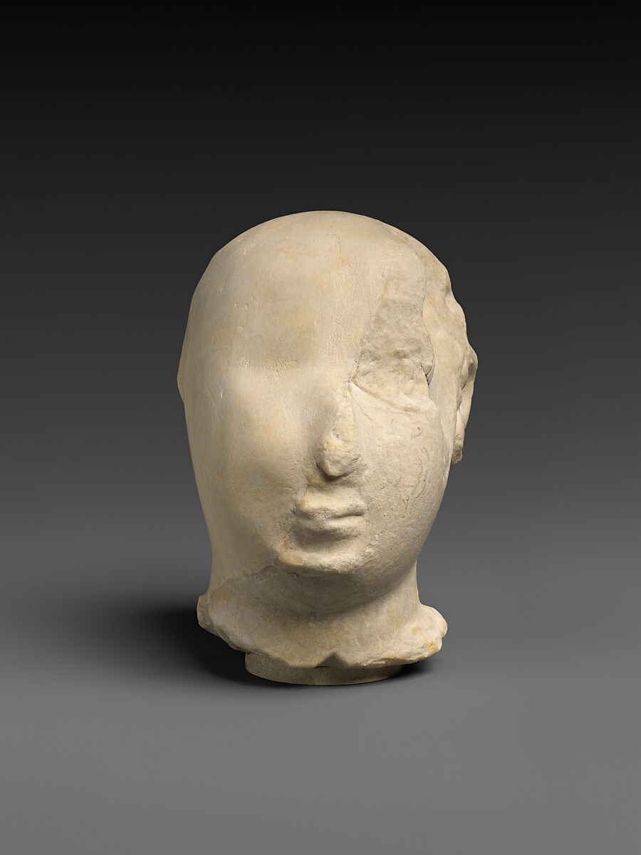 Fragmentary head of a worshiper, Limestone, Sumerian 