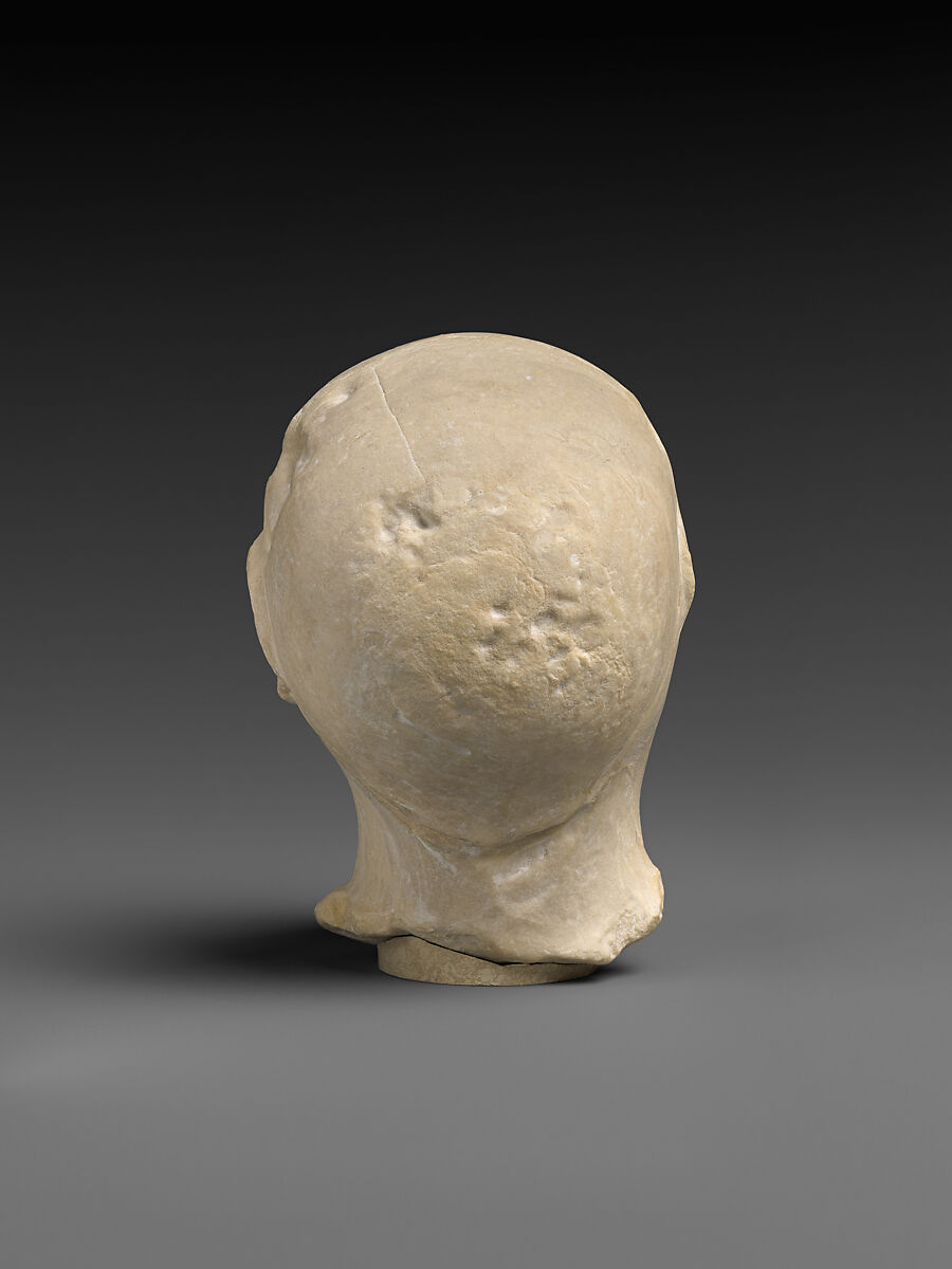 Fragmentary head of a worshiper, Limestone, Sumerian