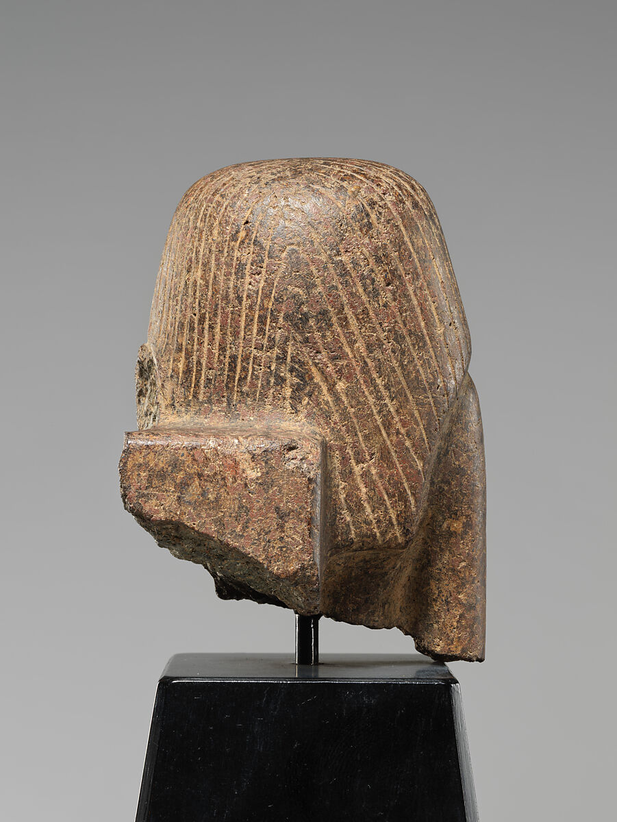 Upper half of a woman from a pair or group statue, Granite (?)