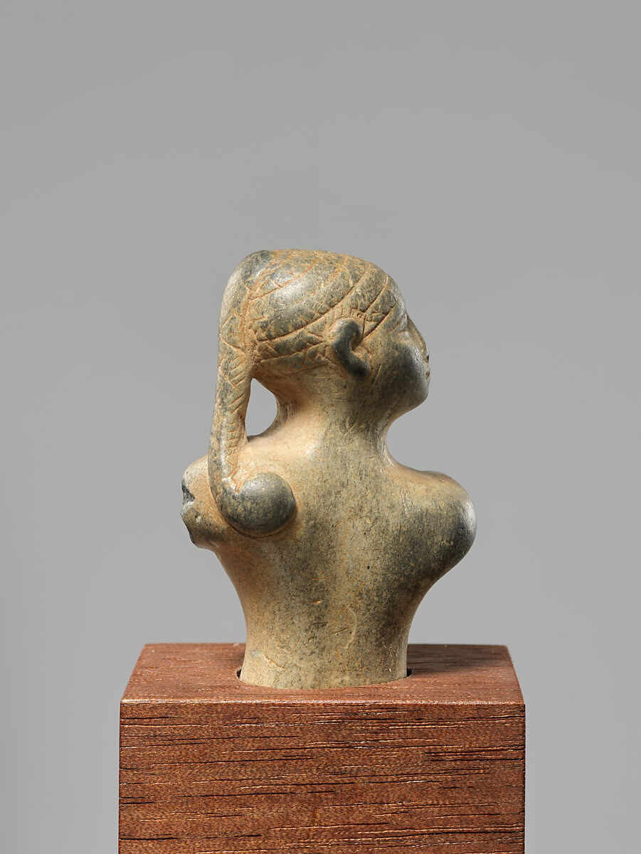 Statuette of a female figure with a braid, Steatite