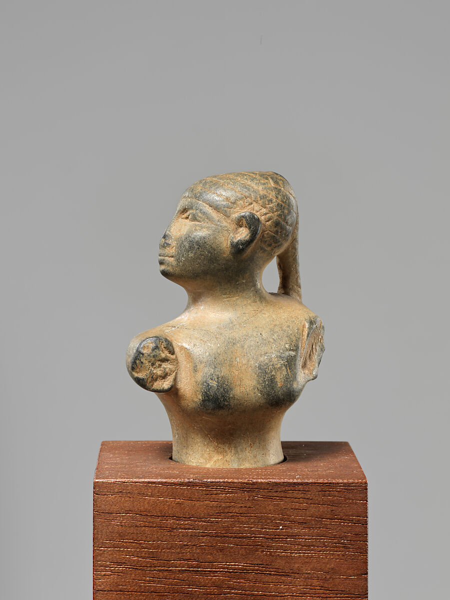 Statuette of a female figure with a braid, Steatite 