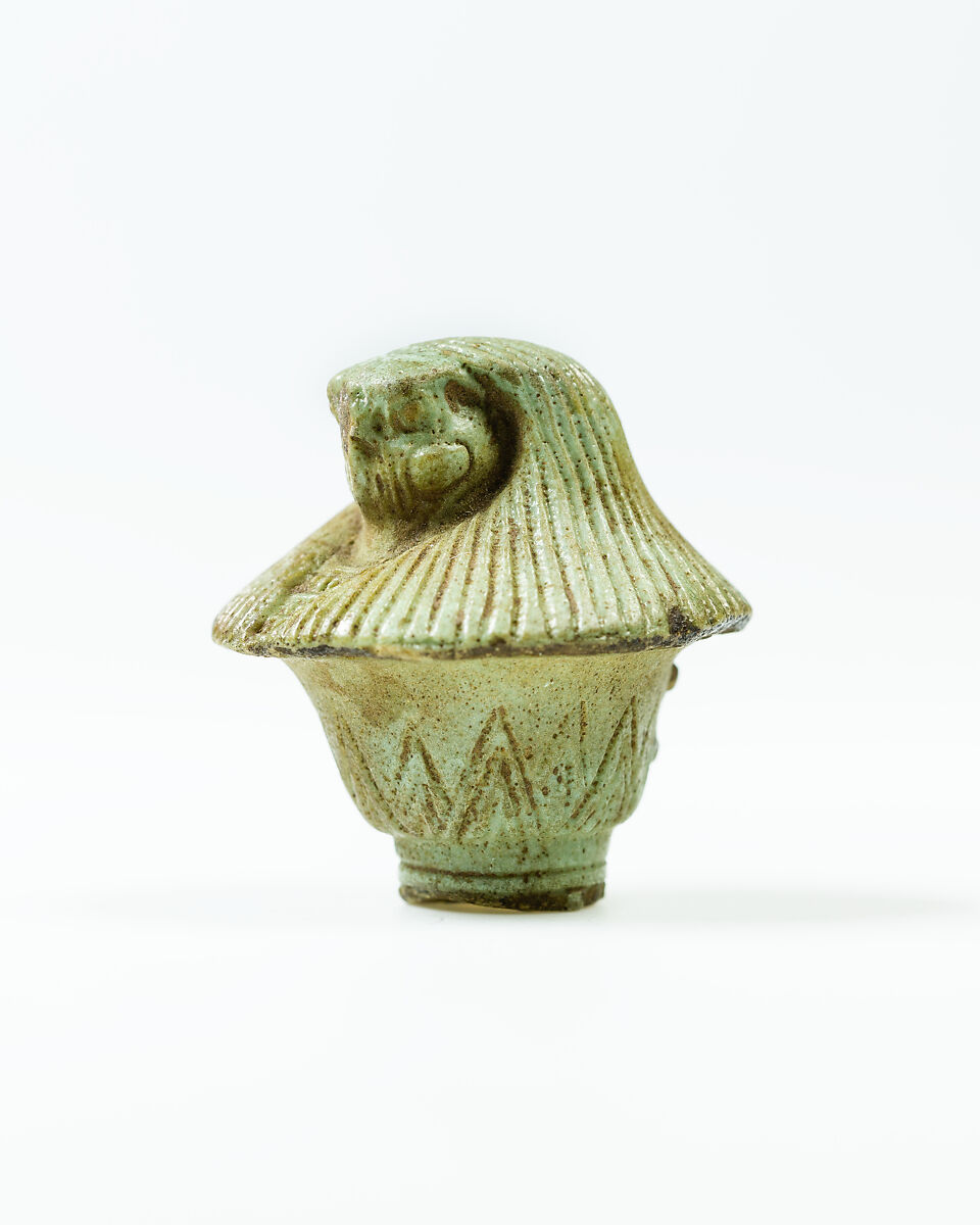 Top of papyrus scepter amulet with falcon head, Faience 