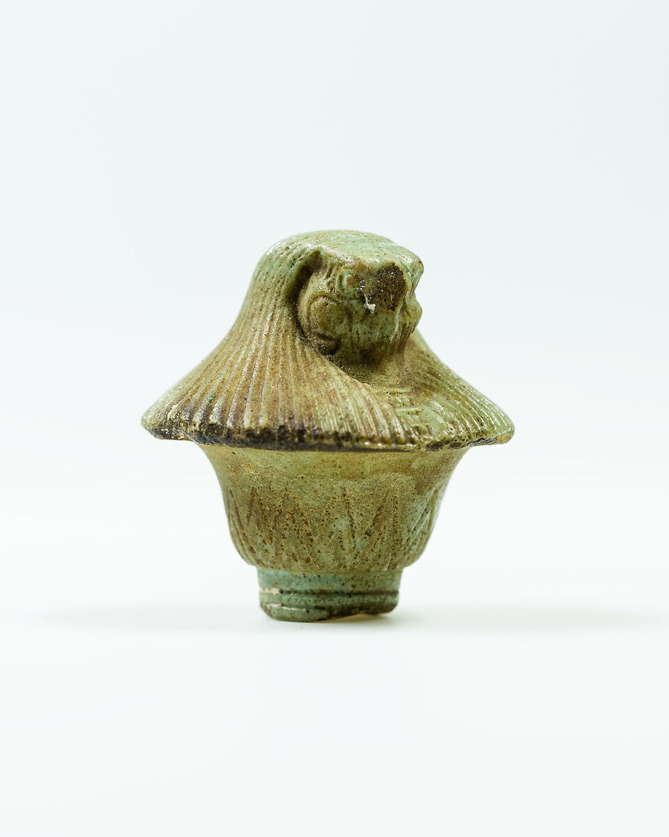 Top of papyrus scepter amulet with falcon head, Faience