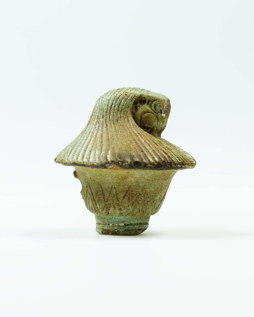 Top of papyrus scepter amulet with falcon head, Faience