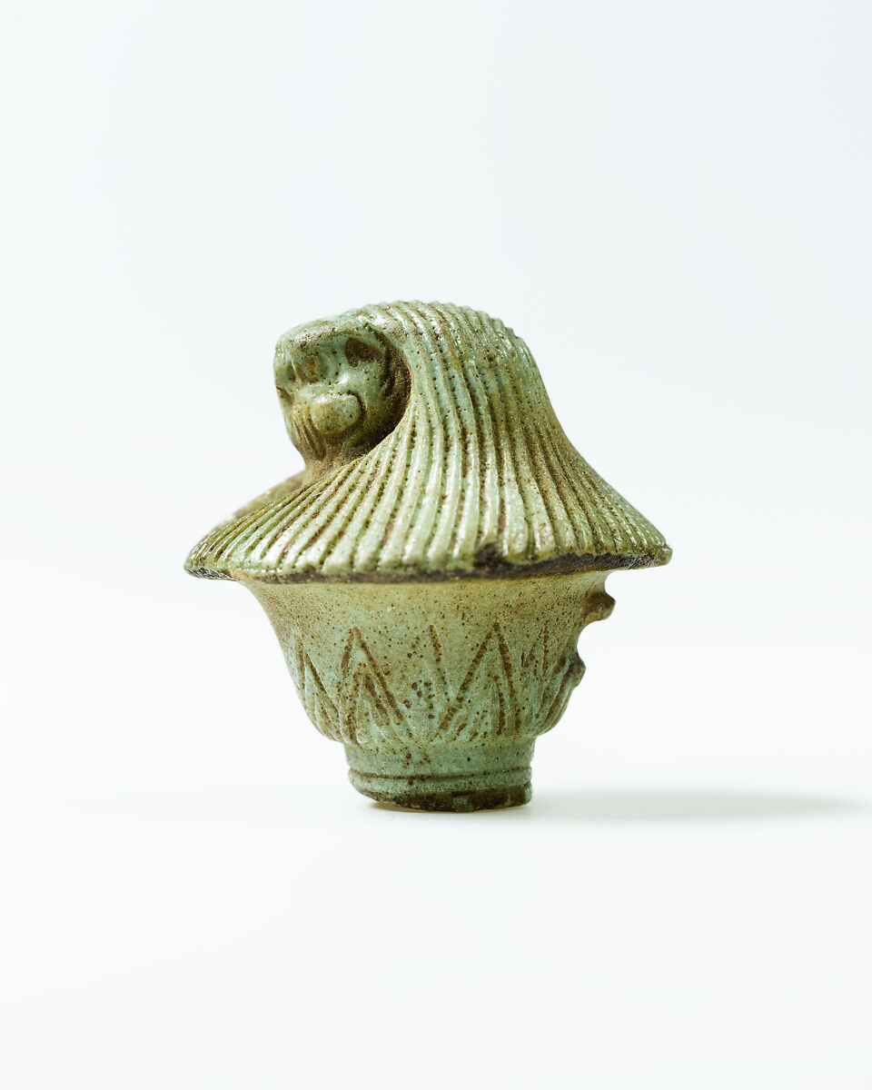 Top of papyrus scepter amulet with falcon head, Faience