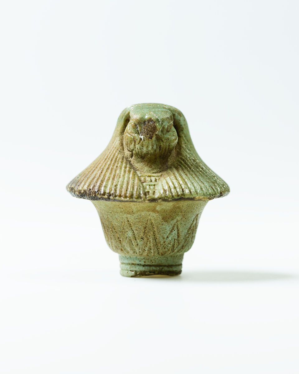 Top of papyrus scepter amulet with falcon head, Faience