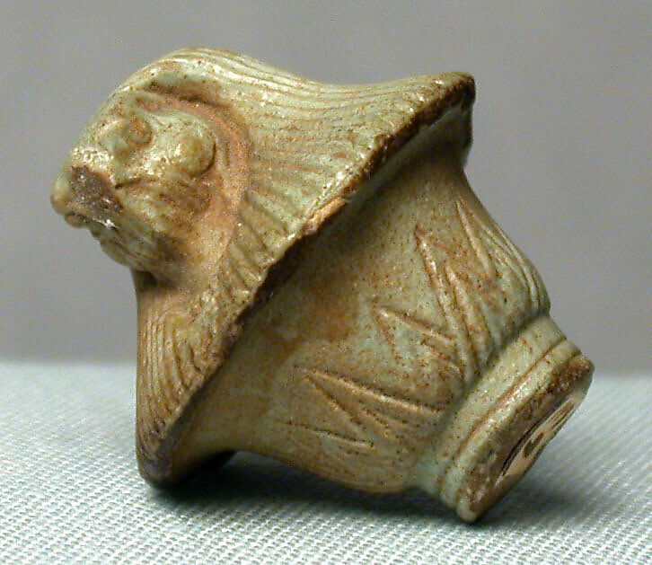 Top of papyrus scepter amulet with falcon head, Faience