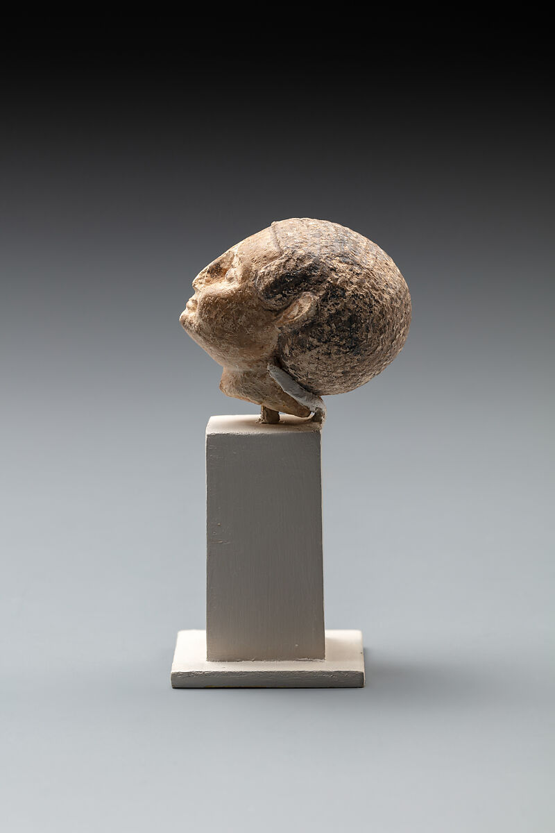 Head of a Male Figure, Limestone, paint
