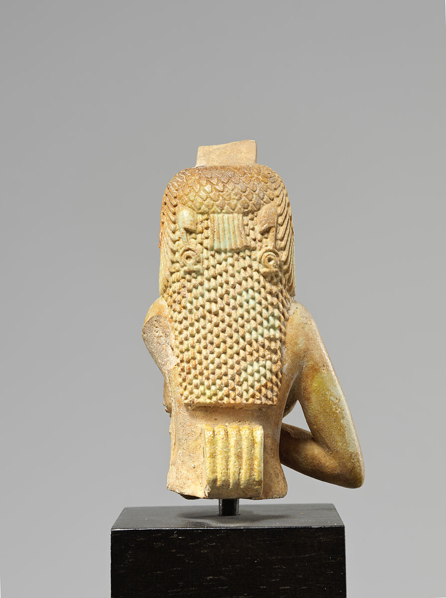 Upper part of a figure of Isis nursing Horus, Faience