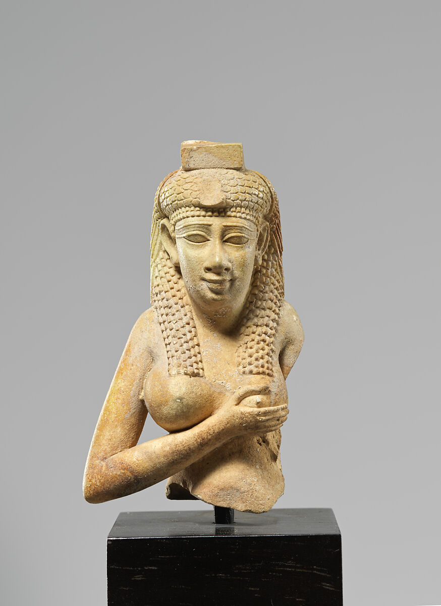 Upper part of a figure of Isis nursing Horus, Faience 