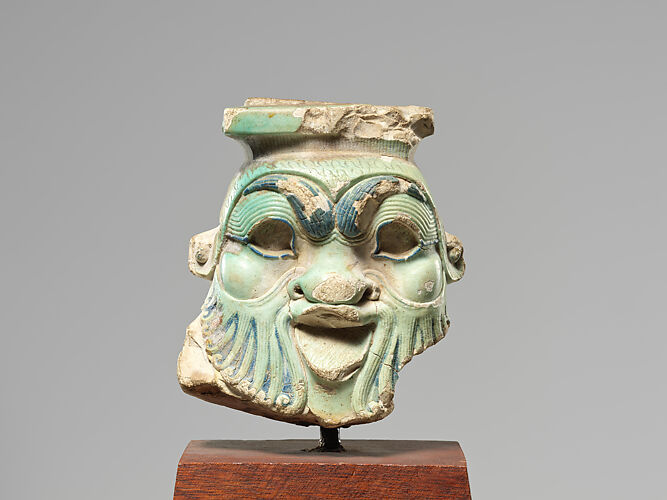 Head from a Bes Jar
