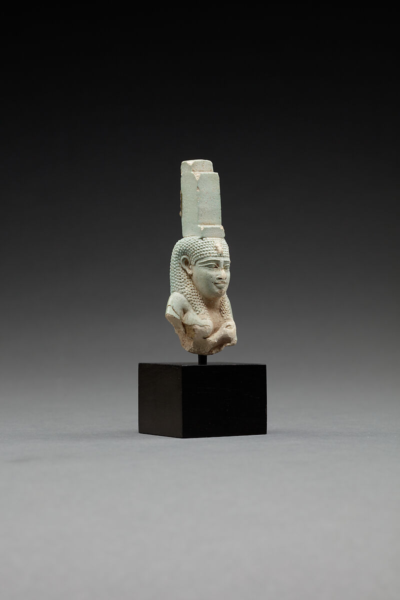 Upper part of a figure of Isis nursing Horus, Faience