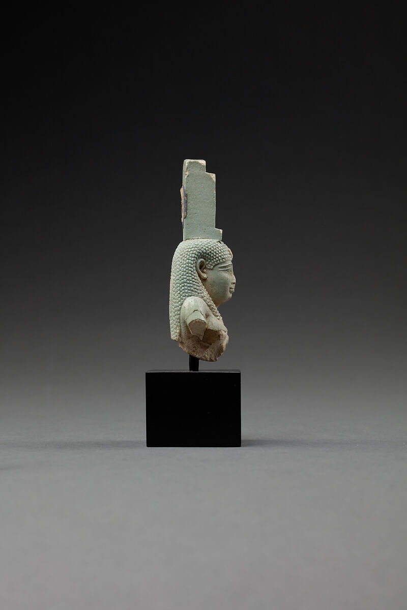 Upper part of a figure of Isis nursing Horus, Faience