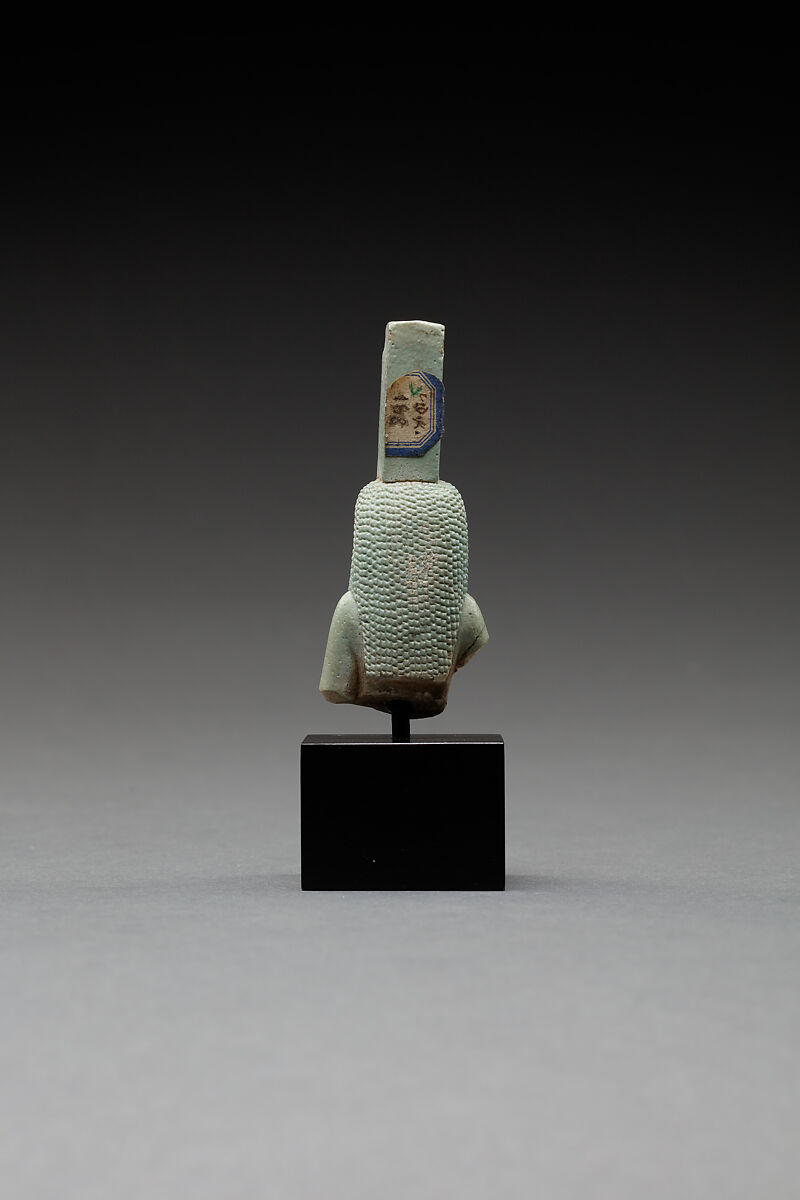 Upper part of a figure of Isis nursing Horus, Faience