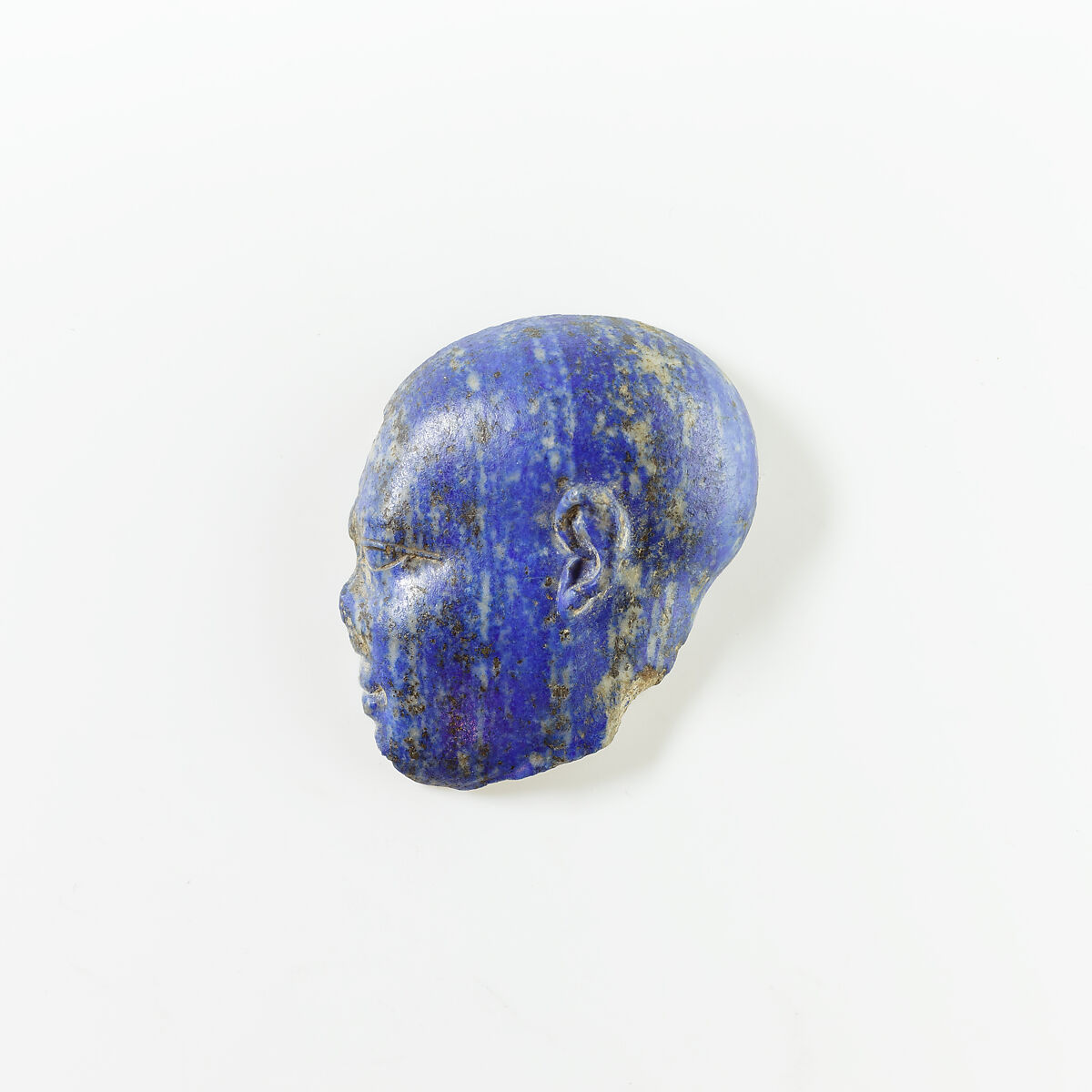 Portion of a Face, possibly a Child God, Lapis lazuli 